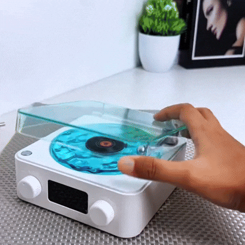 Parlante en forma de tocadiscos relajante y proyector de luces 🌊
